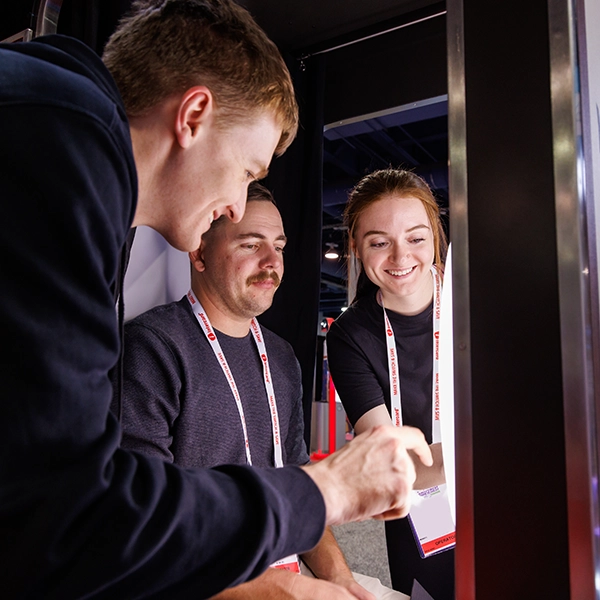 A photo of attendees trying an amusement