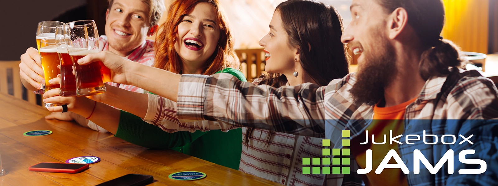 A photo of people toasting over Jukebox Jams beer mats