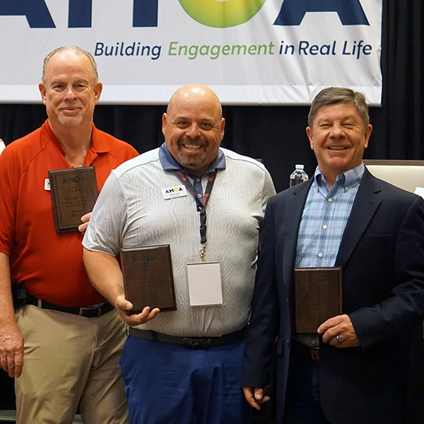 A photo of members receiving awards at the annual breakfast
