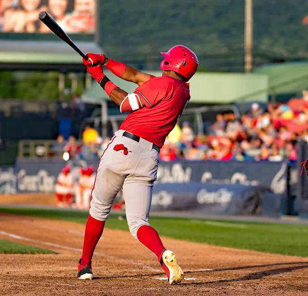 a photo of a baseball player swinging a bat